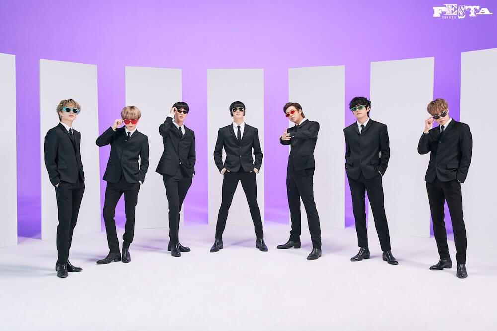 BTS Jungkook dresses up as the King of Rock and Roll for BTS family portraits