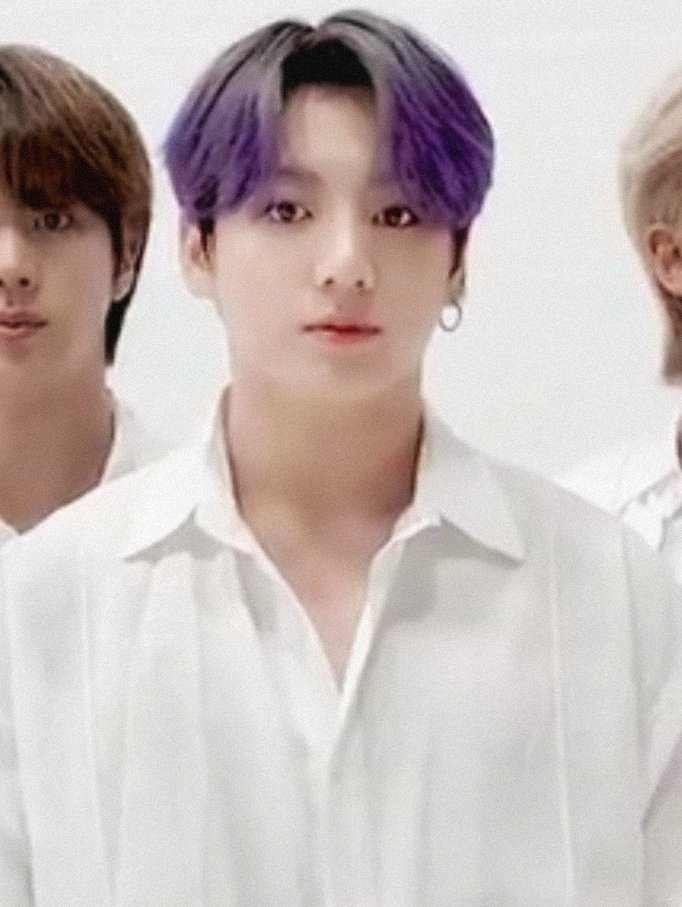 BTS Jungkook appears with a new haircut with purple and silver hair.