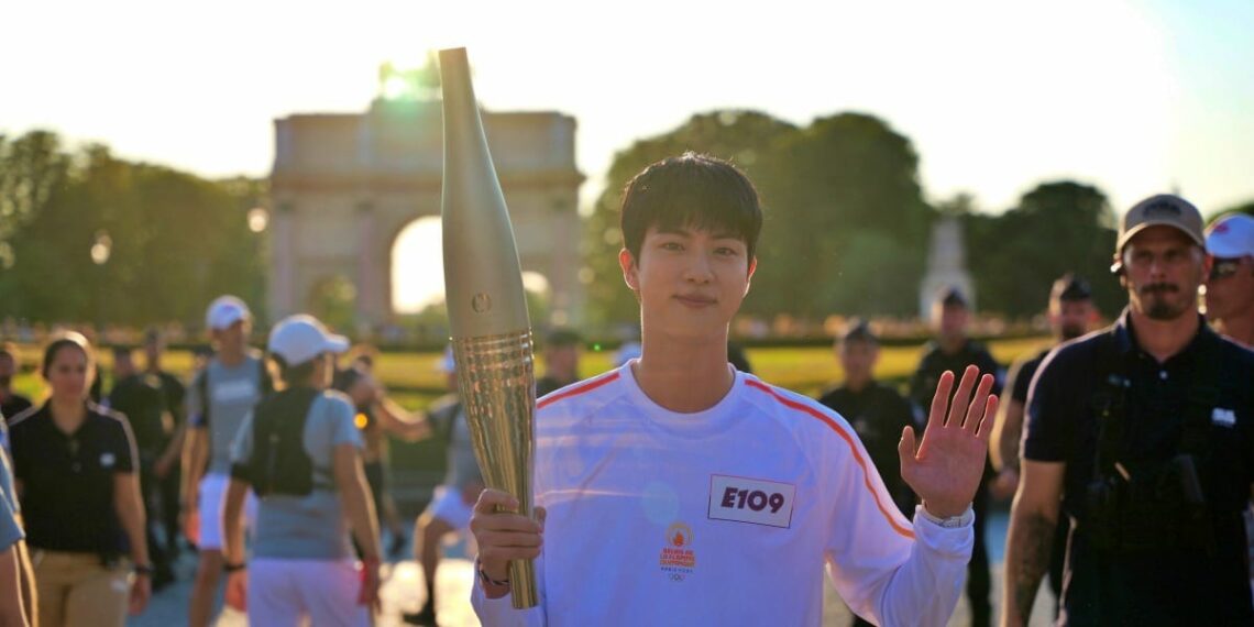 BTS Jin Lights Up Paris 2024 Olympic Games Torch Relay as a Dazzling Torchbearer