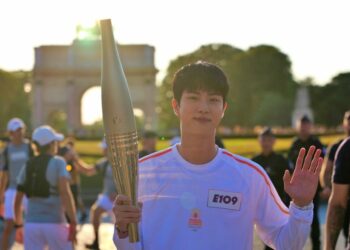 BTS Jin Lights Up Paris 2024 Olympic Games Torch Relay as a Dazzling Torchbearer
