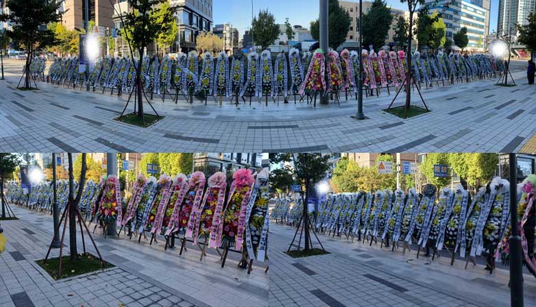 Flower wreath parade against BTS Suga in front of HYBE building. | Instiz